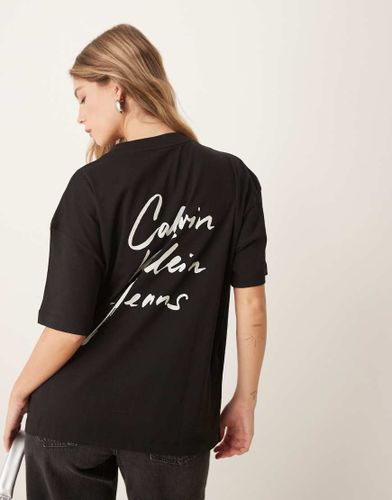 T-shirt oversize nera con scritta del logo - Calvin Klein Jeans - Modalova