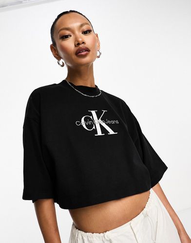 T-shirt nera con ricamo del monogramma del logo - Calvin Klein Jeans - Modalova