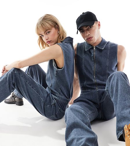 Tuta jumpsuit senza maniche in denim lavaggio con zip - In esclusiva per ASOS - Calvin Klein Jeans - Modalova