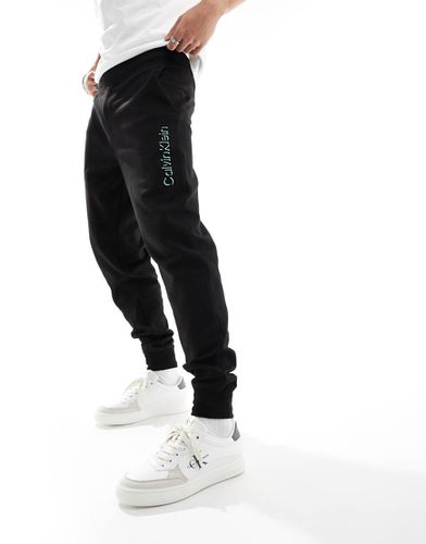 Shadow - Joggers neri con logo in rilievo effetto ombra - Calvin Klein - Modalova