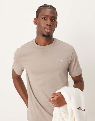 T-shirt beige in tessuto interlock con logo micro - Calvin Klein - Modalova