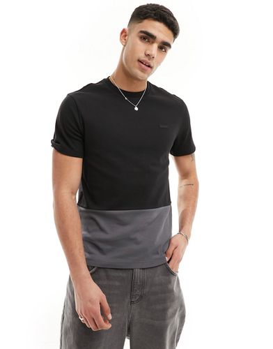T-shirt nera color-block in tessuto interlock - Calvin Klein - Modalova