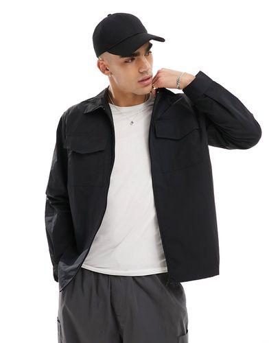 Camicia giacca multitasche nera con zip - Champion - Modalova