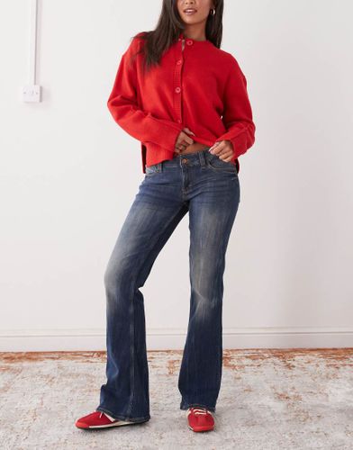 Booty Bei - Jean bootcut stretch taille basse - strié délavé - Cheap Monday - Modalova