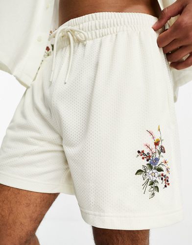 Pantaloncini in rete bianchi con cucitura interna e ricamo a fiori in coordinato - Abercrombie & Fitch - Modalova