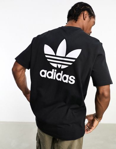 T-shirt con trifoglio nera - adidas Originals - Modalova