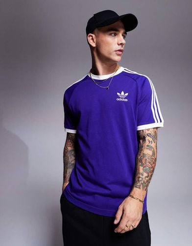 T-shirt college con 3 strisce e bordi a contrasto - adidas Originals - Modalova