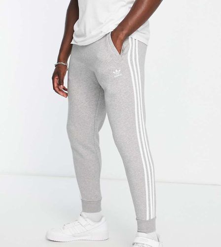 Tall - adicolor - Joggers slim grigi con 3 strisce - adidas Originals - Modalova