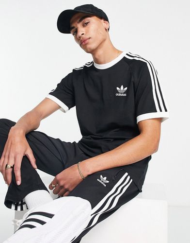 Adicolor - T-shirt nera con tre strisce - adidas Originals - Modalova