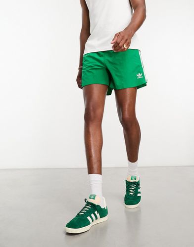 Adicolor Classics - Pantaloncini da running verdi con 3 strisce - adidas Originals - Modalova