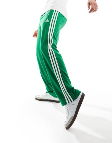 Firebird - Pantaloni sportivi verdi - adidas Originals - Modalova