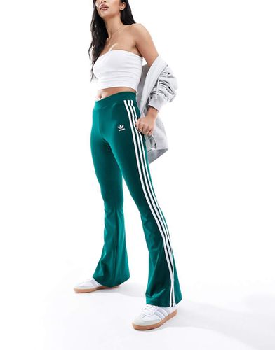 Leggings a zampa college con tre strisce - adidas Originals - Modalova