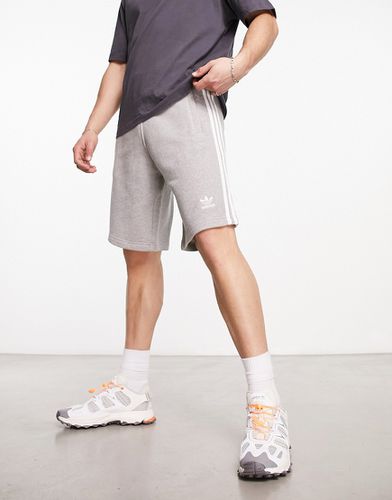 Pantaloncini grigi con tre strisce - adidas Originals - Modalova