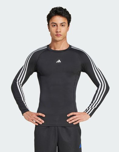 Techfit Compression - Top a maniche lunghe da allenamento con 3 strisce - adidas performance - Modalova