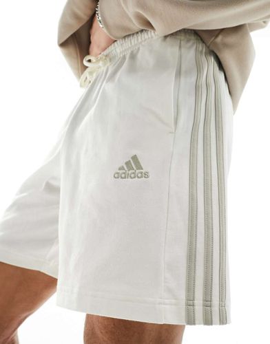 Adidas Training - Pantaloncini in jersey sporco con tre strisce - adidas performance - Modalova