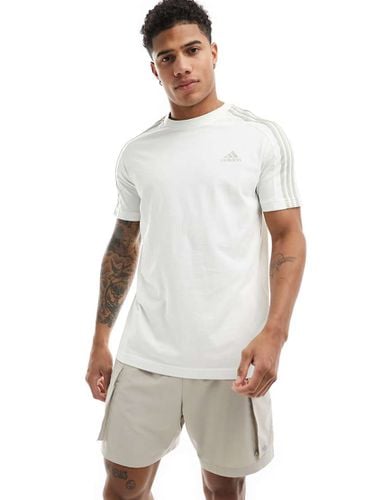 Adidas Training - T-shirt con tre strisce sporco - adidas performance - Modalova