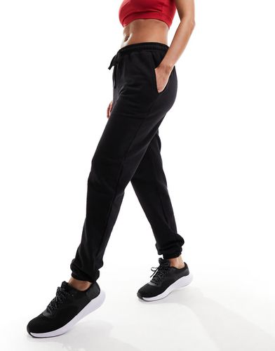 Joggers slim da allenamento con rovescio a ricci - ASOS - Modalova