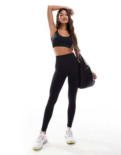 Leggings da palestra a vita alta neri lisci senza cuciture - ASOS - Modalova