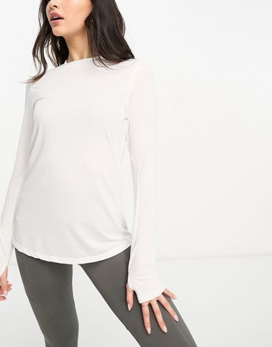 Top da running a maniche lunghe con logo iconico - ASOS - Modalova