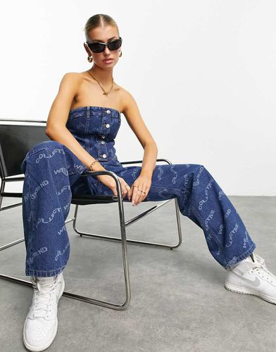 Jeans con stampa al laser - ASOS WEEKEND COLLECTIVE - Modalova