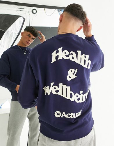 ASOS Actual - Felpa oversize con logo e stampa "Health and Wellbeing" sul retro - ASOS DESIGN - Modalova