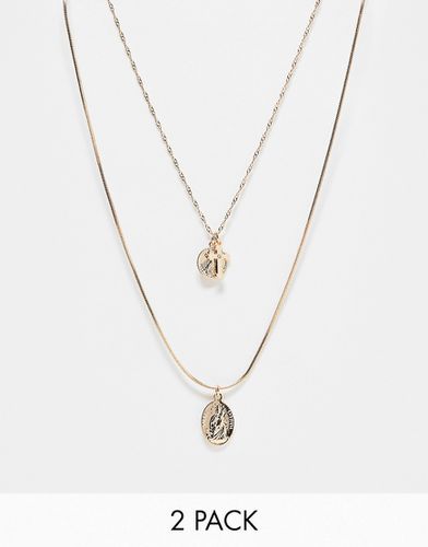 Confezione da 2 collane con ciondoli a croce e con San Cristoforo color oro - ASOS DESIGN - Modalova
