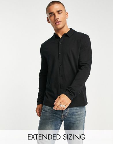 Camicia in jersey nera a maniche lunghe con bottoni - ASOS DESIGN - Modalova