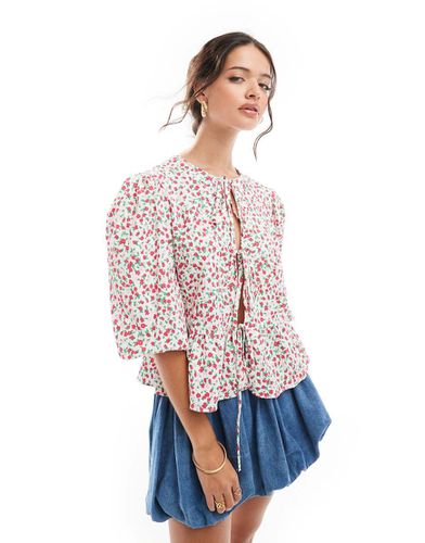 Camicia rosa e rossa a fiorellini con fondo peplo - ASOS DESIGN - Modalova