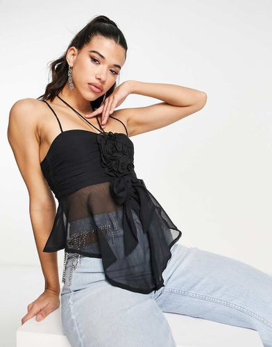 Canotta babydoll nera con decorazioni floreali - ASOS DESIGN - Modalova