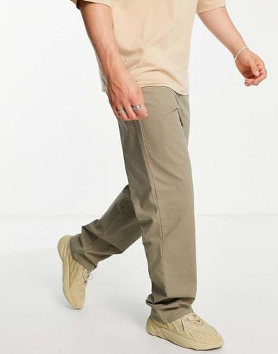 Chino comodi kaki slavato - ASOS DESIGN - Modalova