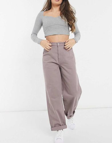 Chino extra larghi lilla slavato - ASOS DESIGN - Modalova