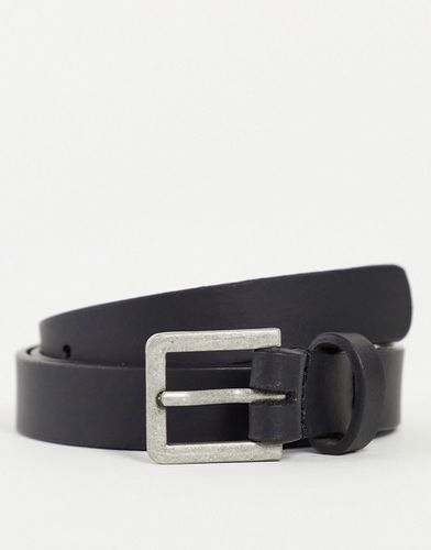 Cintura skinny in pelle nera con fibbia argento - ASOS DESIGN - Modalova