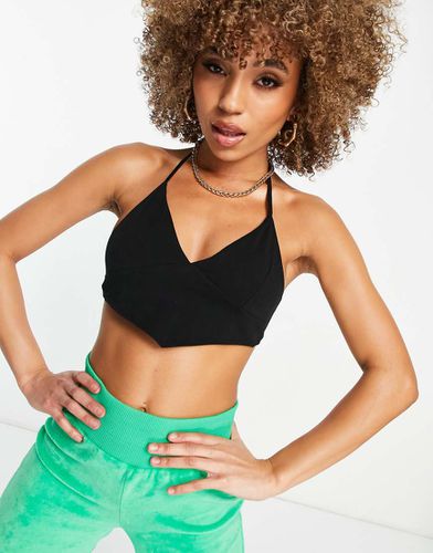 Crop top allacciato al collo con fondo a punta - ASOS DESIGN - Modalova