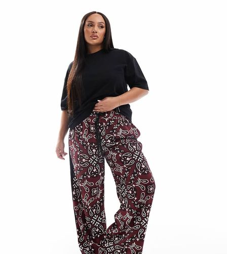 Curve - Pantalon à enfiler avec empiècement contrastant et imprimé bandana - Cerise foncé - Asos Design - Modalova