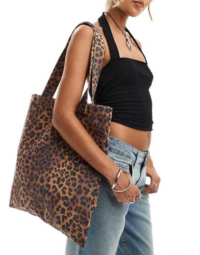 Borsa shopping in tela con stampa leopardata - ASOS DESIGN - Modalova