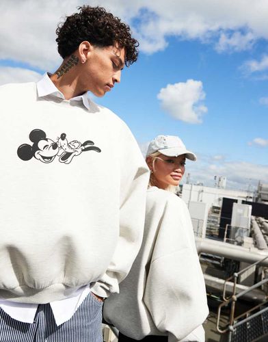 Disney - Felpa oversize in tessuto scuba mélange con stampa di Topolino e Pluto - ASOS DESIGN - Modalova