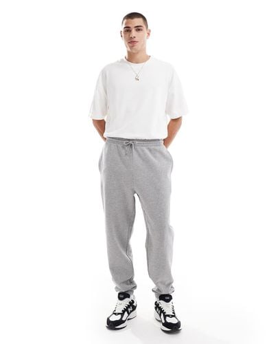 Essential - Joggers affusolati mélange - ASOS DESIGN - Modalova