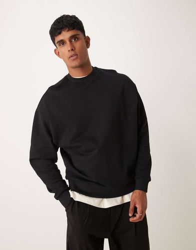 Essential - Joggers oversize neri - ASOS DESIGN - Modalova