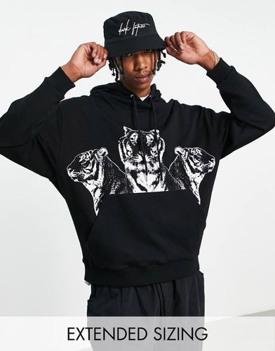 Felpa oversize nera con cappuccio e stampa di tigre - ASOS DESIGN - Modalova