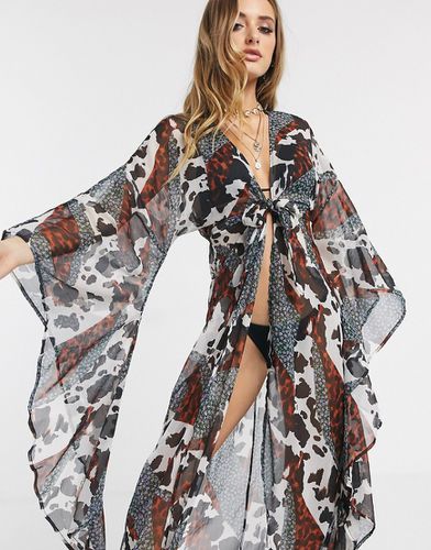 Kimono lungo da mare glam con maniche esagerate e stampa animalier a fiori - ASOS DESIGN - Modalova