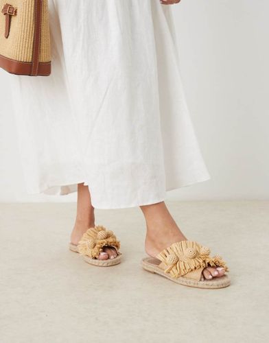Jovie - Espadrilles à enfiler en raphia naturel avec pompons - Asos Design - Modalova