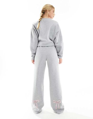 Joggers mélange con fiocchi in coordinato - ASOS DESIGN - Modalova