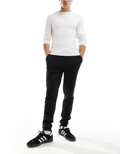 Joggers skinny in tessuto scuba neri - ASOS DESIGN - Modalova