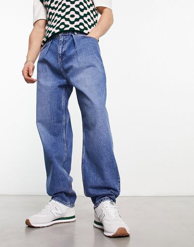 Jeans a palloncino lavaggio medio - ASOS DESIGN - Modalova