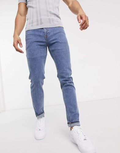 Jeans skinny lavaggio medio - ASOS DESIGN - Modalova