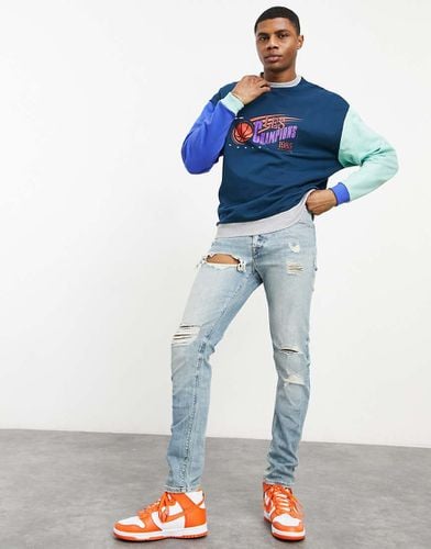 Jeans skinny lavaggio chiaro con strappi evidenti - ASOS DESIGN - Modalova