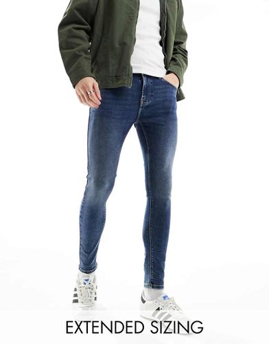 Jeans spray power stretch lavaggio scuro - ASOS DESIGN - Modalova