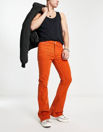 Jeans stretch elasticizzato in velluto a coste color ruggine - ASOS DESIGN - Modalova