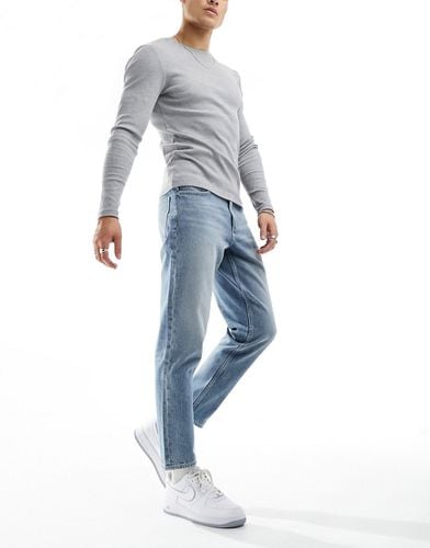 Jeans rigidi classici lavaggio azzurro - ASOS DESIGN - Modalova