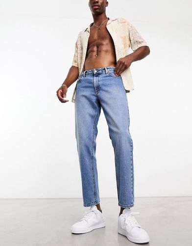 Jeans rigidi classici lavaggio medio - ASOS DESIGN - Modalova